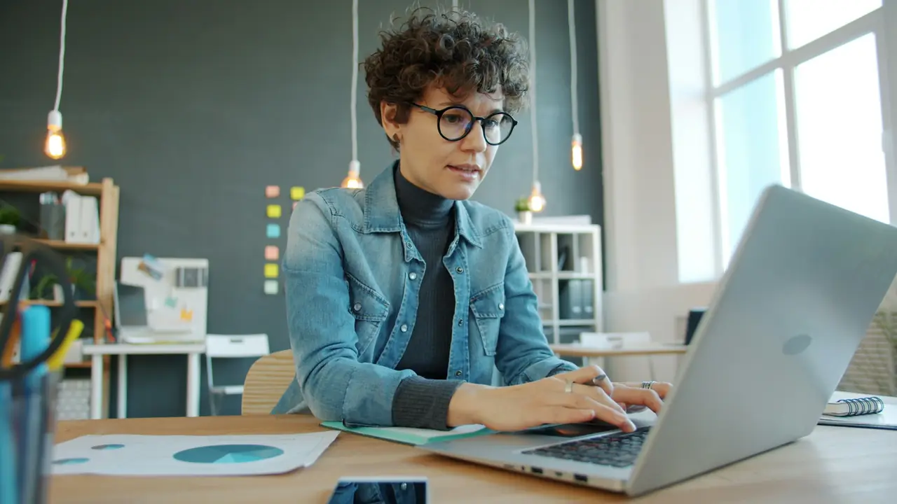 A property manager working at her laptop